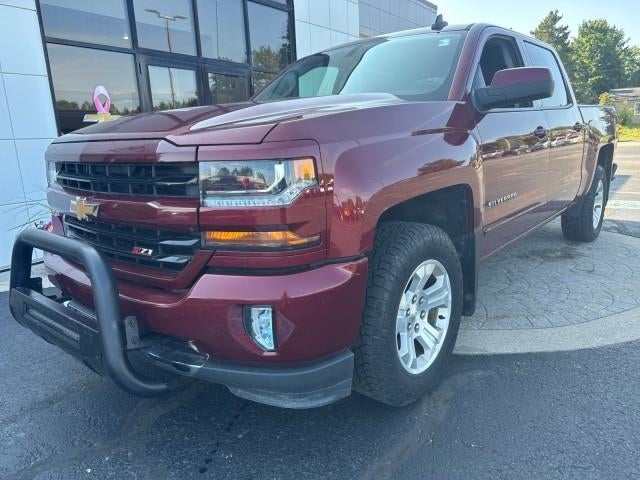 2017 Chevrolet Silverado 1500 LT in Siren Red Tintcoat — front three-quarter view